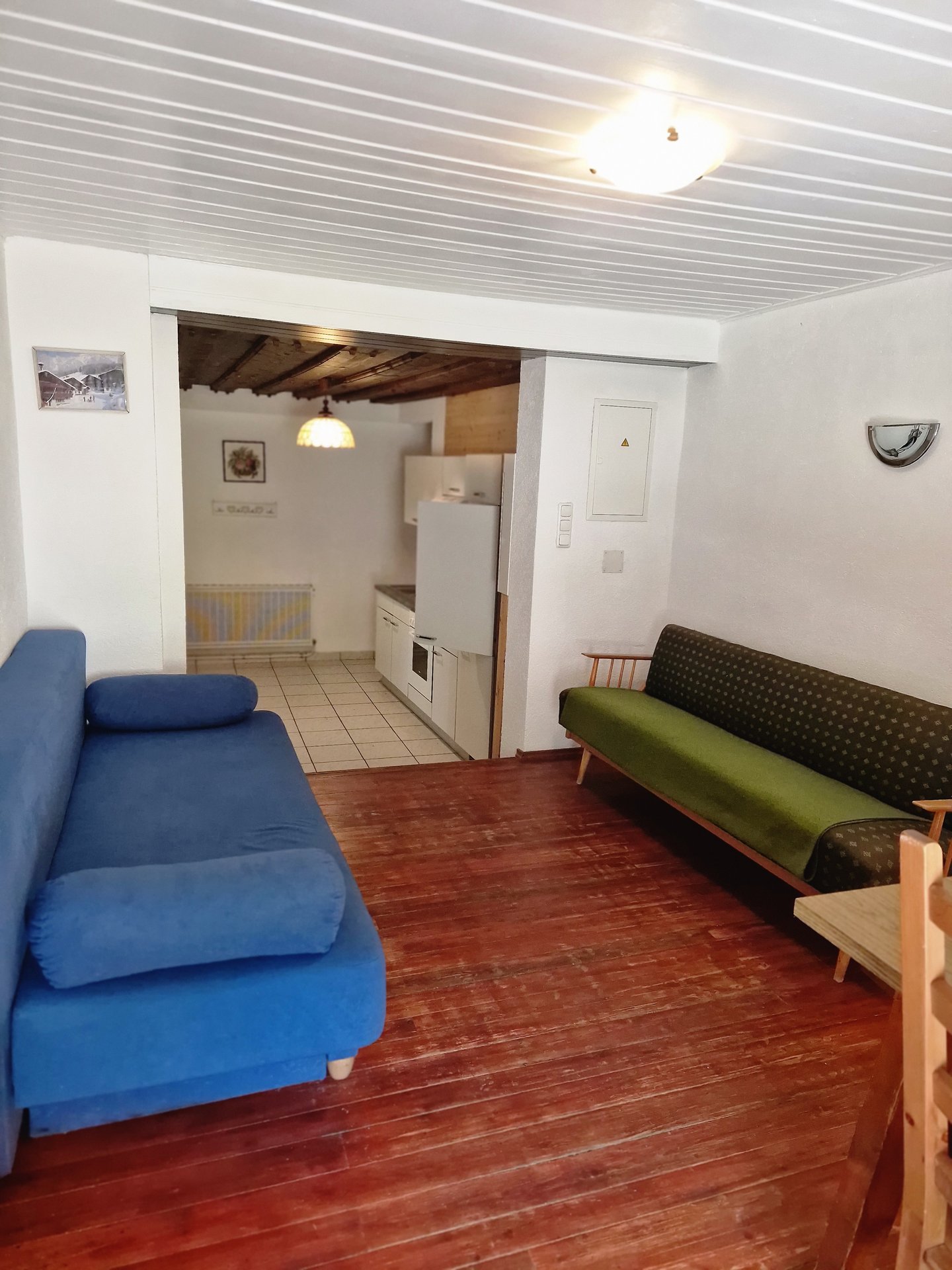 Zaunerhof Appartement 5 - Authentisches Wohnzimmer mit Holzdecke